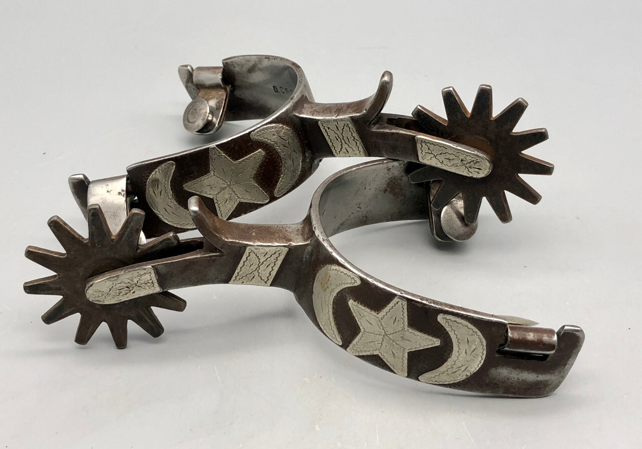 Early O. Crockett star-and-moon spurs